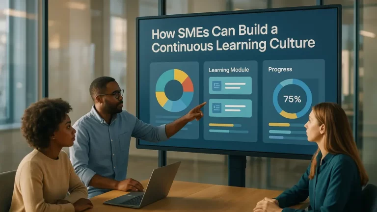 Team collaborating in a modern office using digital tools to build a continuous learning culture in SMEs.
